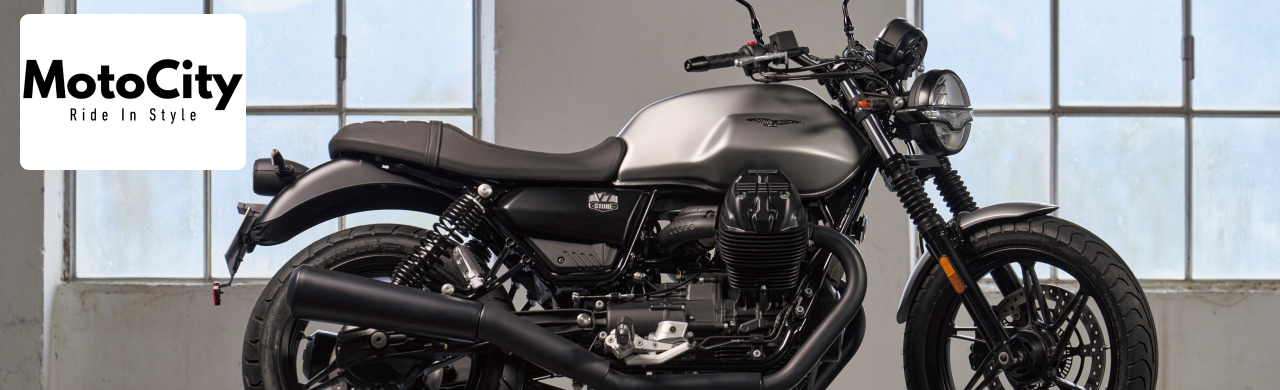 Moto Guzzi V7 displayed in front of MotoCity USA showroom in Daytona Beach