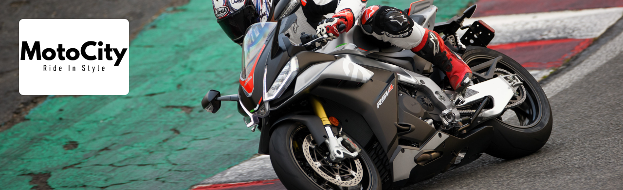 Close-up of an Aprilia RSV4 with an aftermarket exhaust system installed at MotoCity USA.