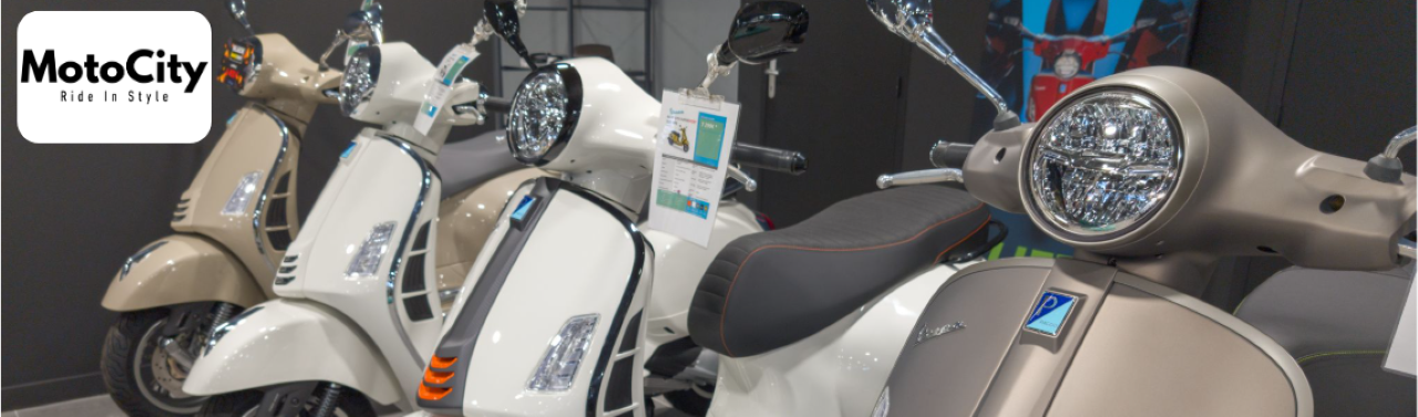 Wide-angle view of MotoCityUSA showroom with multiple 150cc scooters lined up, ready for test rides.