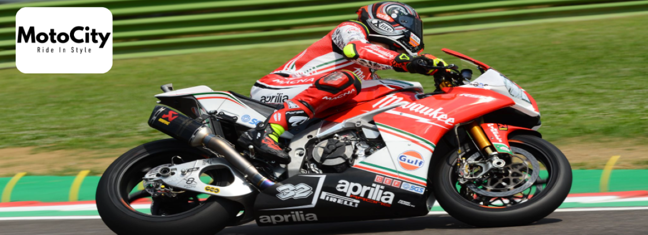 Rider leaning into a curve on a red Aprilia RSV4 on a coastal Florida road